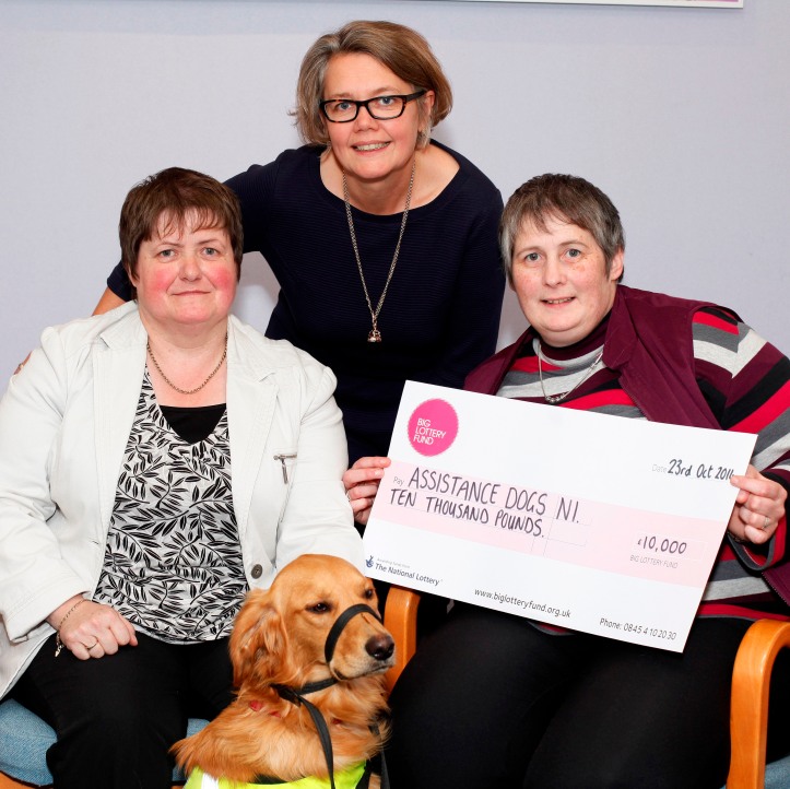 Assistance Dogs NI celebrate winning £10,000 with Joanne McDowell, Big Lottery Fund NI Director 